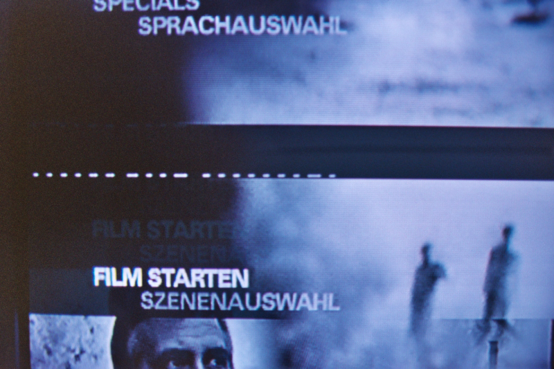 NTSC TV sets seriously distort PAL-encoded video signals. Picture of a television screen showing the distortion produced by inputting a PAL-encoded video signal to an NTSC TV set. The picture is in black and white rather than color, and the vertical hold is seriously out of adjustment.
